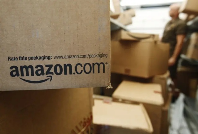 美国物流业龙头优比速（UPS）宣布，因应其与电商巨擘亚马逊合作的廉价包裹运送服务大减，预计在今年内裁撤两万名人力.jpg